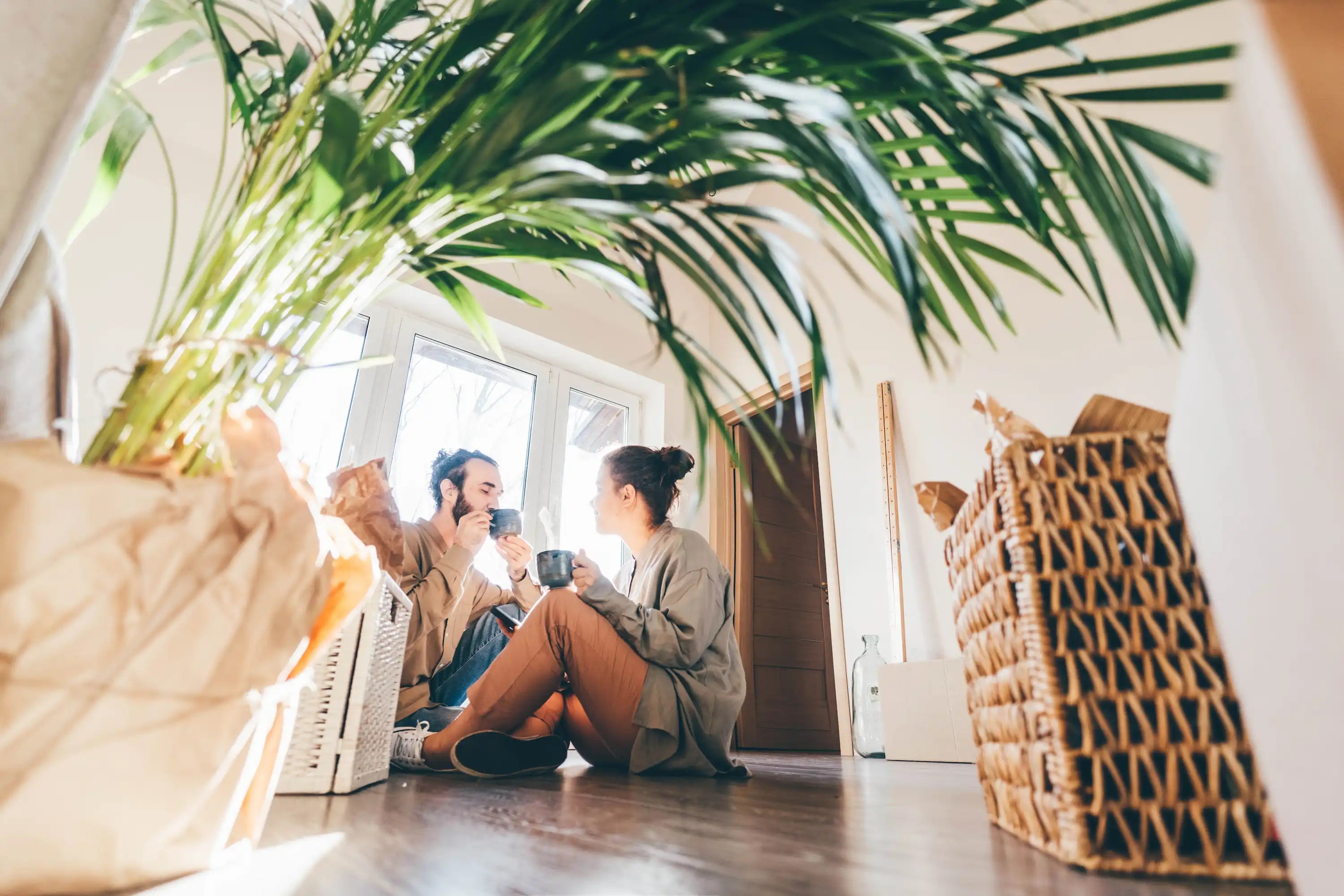 happy couple enjoying coffee depicting intentional living