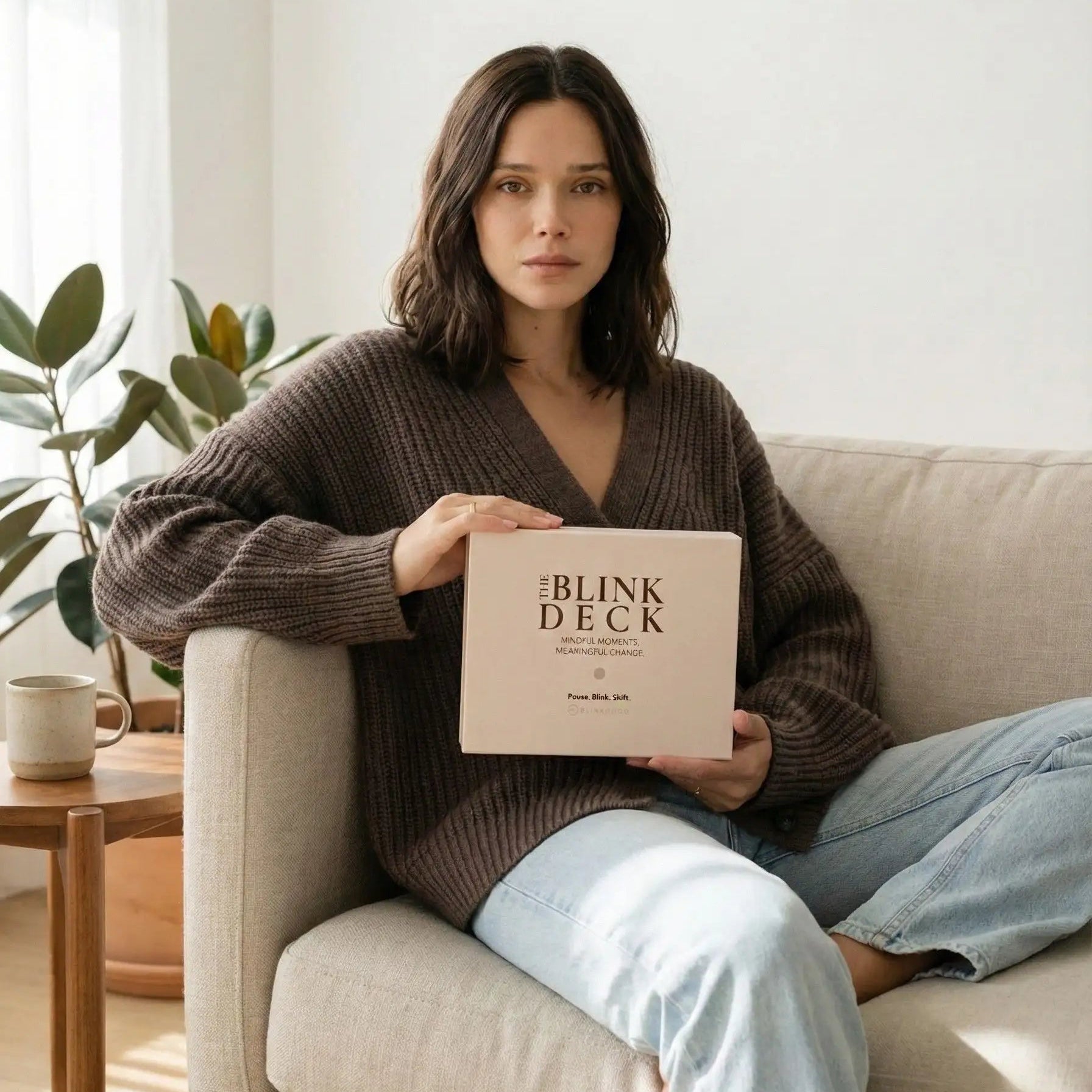 model holding the blink deck