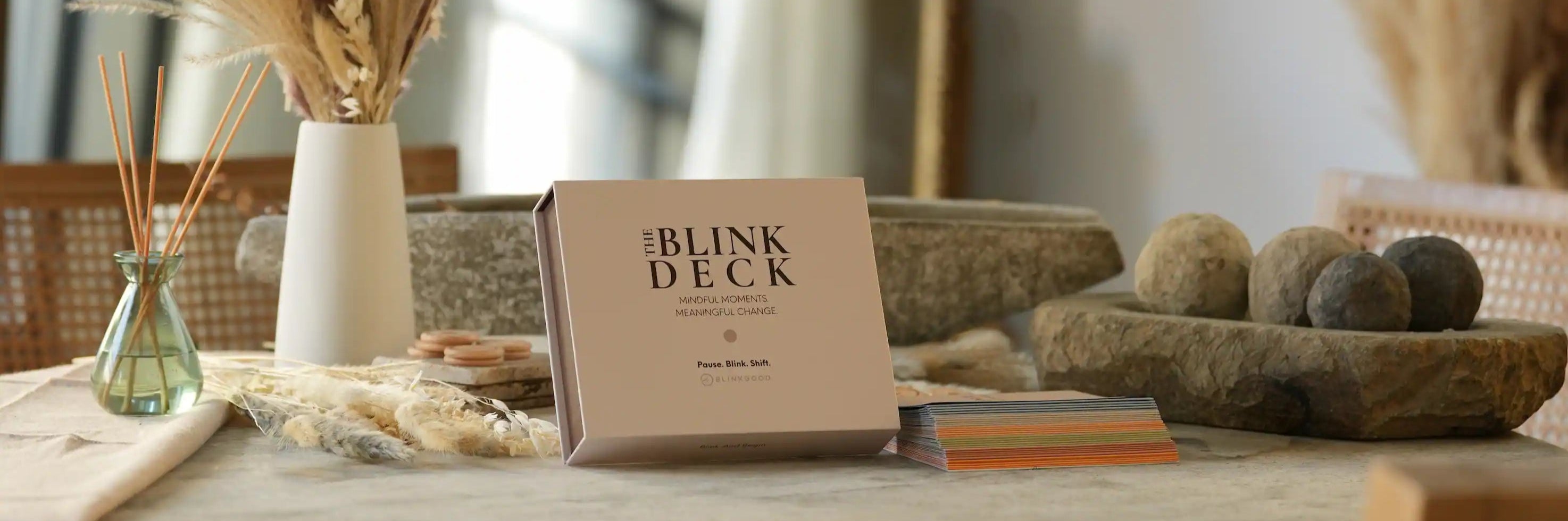 Blink Deck product on a table with decorative items