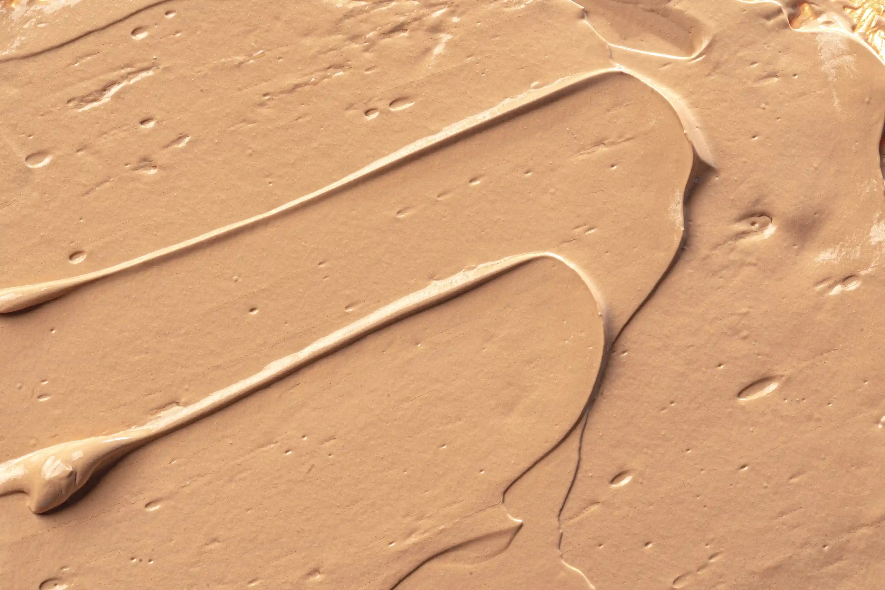 Close-up of brown cream or paste texture